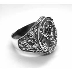 Sygnet Św. Huberta, jeleń z krzyżem.